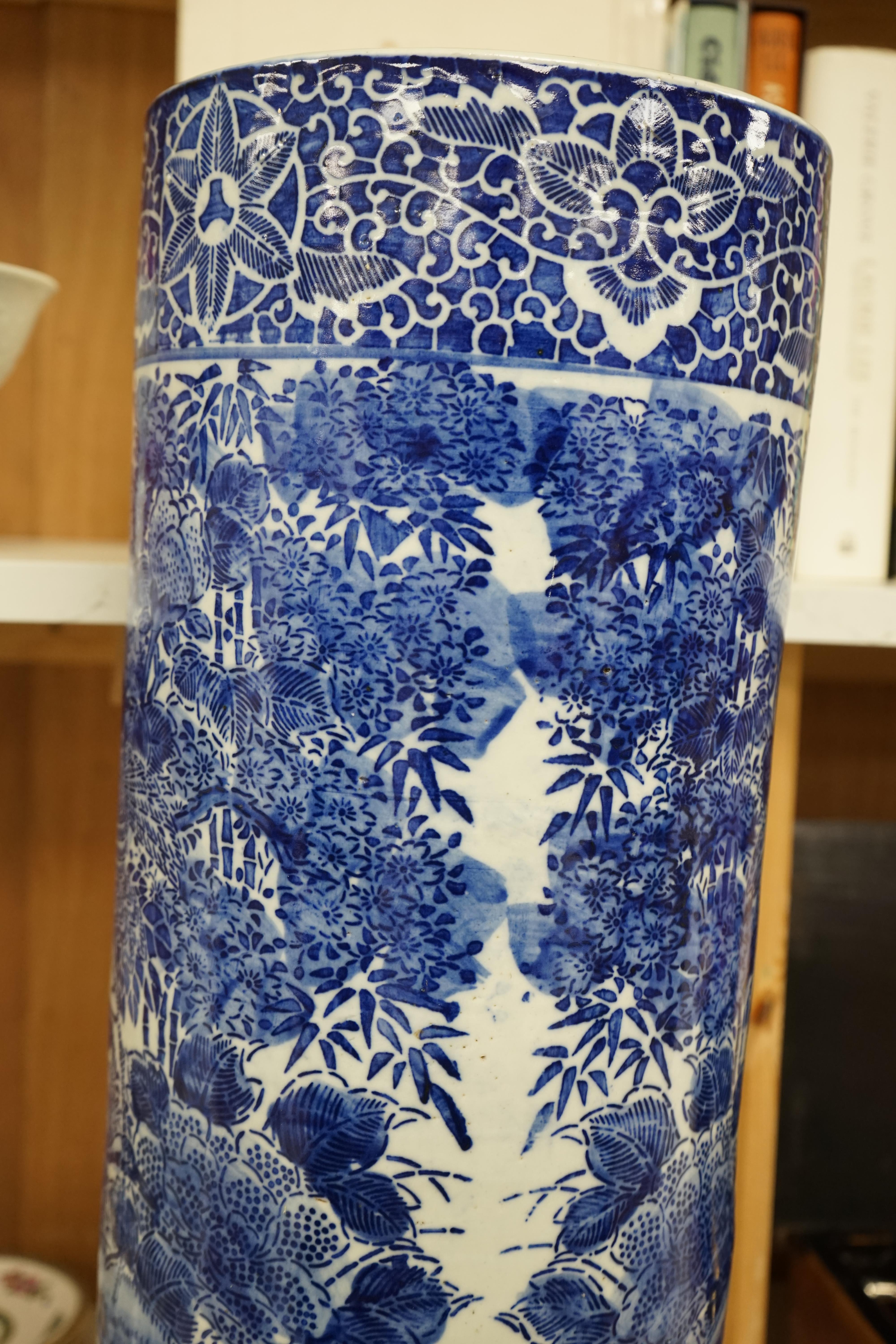 A Japanese blue and white stick stand, 60cm high., Condition - good